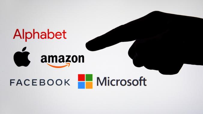 Big Tech company logos: Alphabet, Amazon, Apple, Facebook and Microsoft with a silhouette of a hand pointing at them