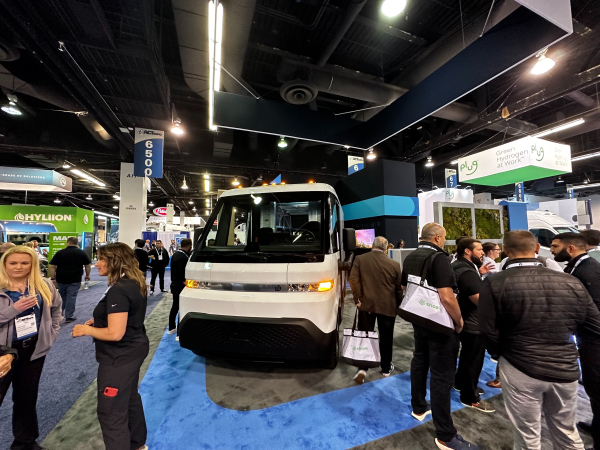 A white BrightDrop vehicle on display at ACT Expo