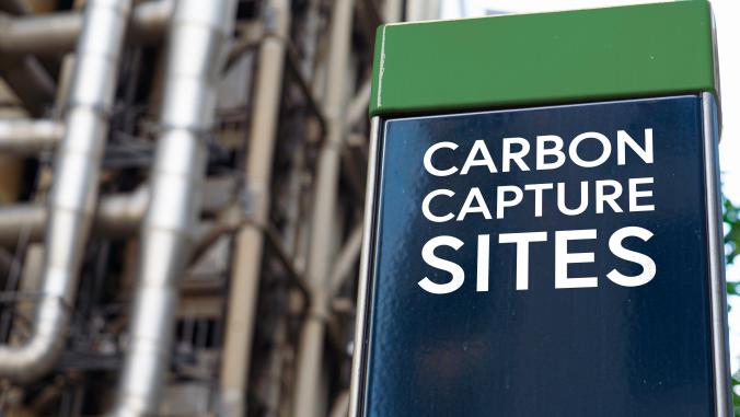 A picture of a sign that says 'CARBON CAPTURE SITES' 