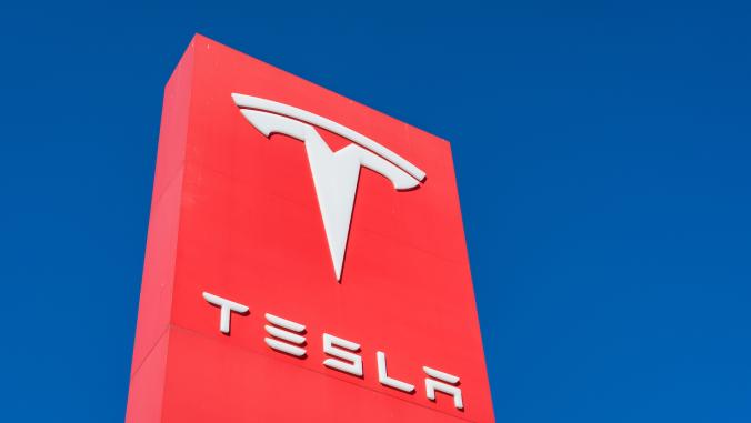 Tesla Motors red sign and logo