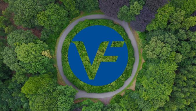 VF Corp logo embedded on image of a roundabout in the middle of a forest in Belgium. 